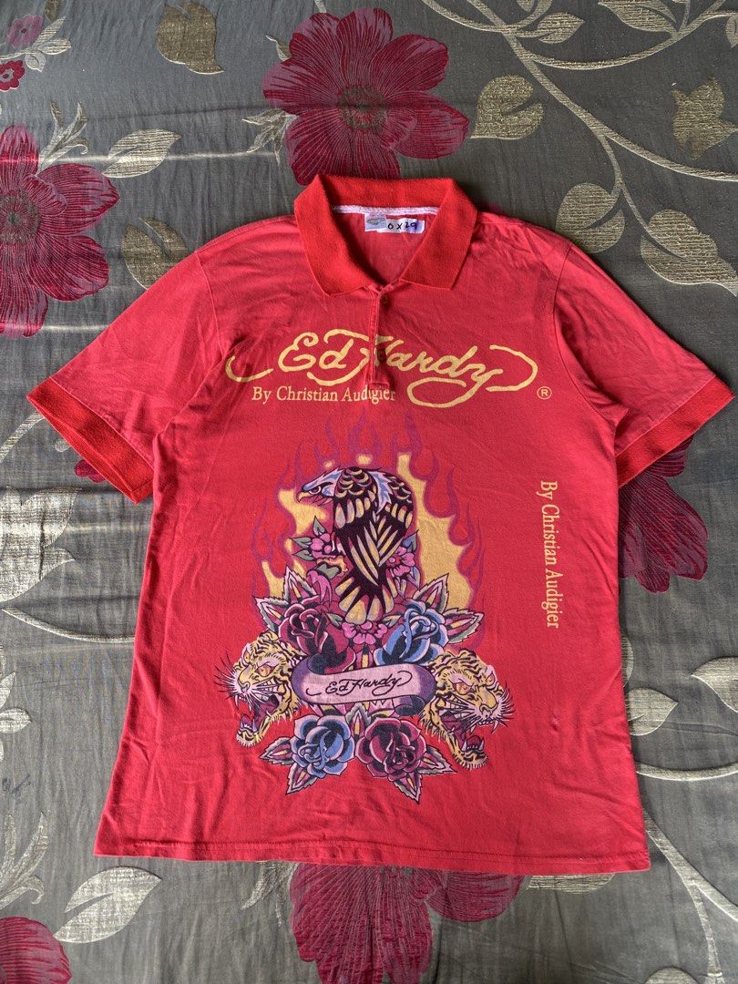 Y2K Ed Hardy polo shirt (Category: Activewear) located in Balete. Submitted by shimien02 (Listing ID 1469816067, Image 1). Description: Excellent condition color rate 9/10 issue: small black stain, multiple tiny pinhole dimes: width 20/ length 29.