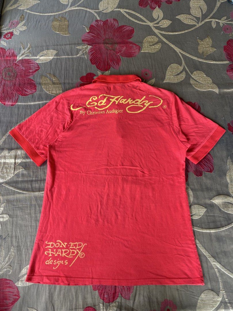 Y2K Ed Hardy polo shirt (Category: Activewear) located in Balete. Submitted by shimien02 (Listing ID 1469816067, Image 2). Description: Excellent condition color rate 9/10 issue: small black stain, multiple tiny pinhole dimes: width 20/ length 29.