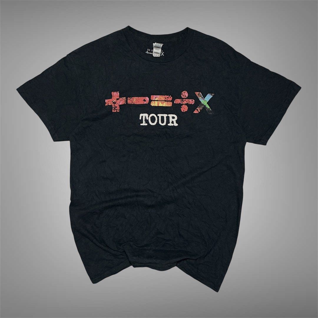 Ed Sheeran Mathematics Tour Melbourne 2023 T-Shirt (Category: Tshirts & Polo Shirts ) located in Naga. Submitted by lootersfinder (Listing ID 1469856435, Image 1). Description: - Event: Ed Sheeran Mathematics Tour (Melbourne MCG, March 2, 2023) - Color: Black - Design: Colorful mathematical symbols on front with tour text; back features date, venue, city, and artist name in red and white - Fit: Standard fit with short sleeves and crew neck - Cond
