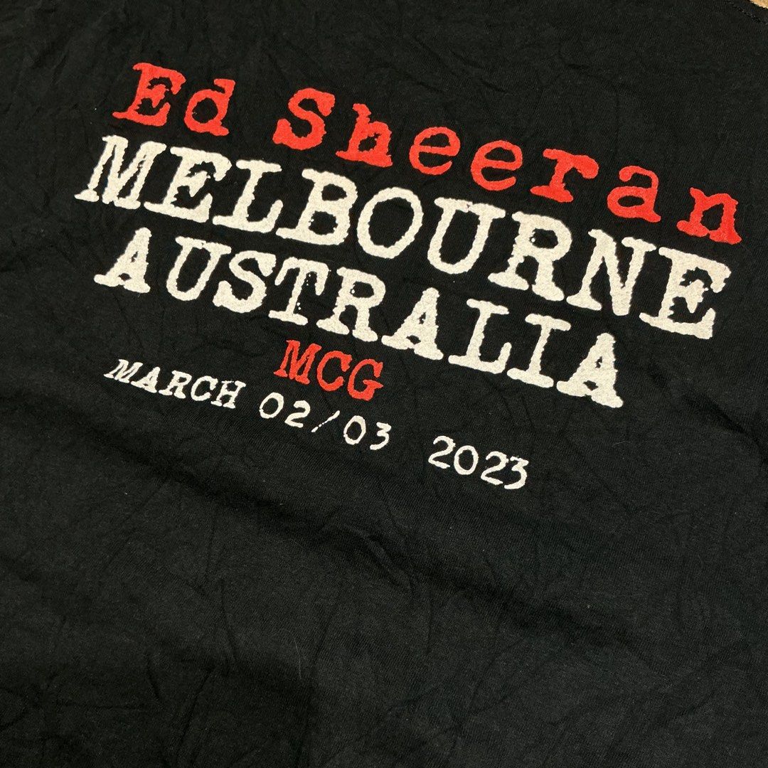 Ed Sheeran Mathematics Tour Melbourne 2023 T-Shirt (Category: Tshirts & Polo Shirts ) located in Naga. Submitted by lootersfinder (Listing ID 1469856435, Image 3). Description: - Event: Ed Sheeran Mathematics Tour (Melbourne MCG, March 2, 2023) - Color: Black - Design: Colorful mathematical symbols on front with tour text; back features date, venue, city, and artist name in red and white - Fit: Standard fit with short sleeves and crew neck - Cond
