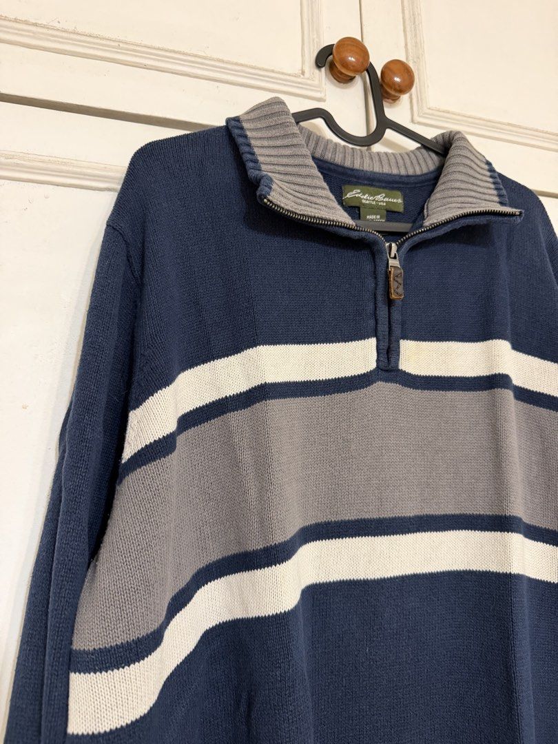 Eddie Bauer Quarter-Zip Striped Knit Sweater (Category: Coats, Jackets and Outerwear) located in Rizal. Submitted by rianaht (Listing ID 1469932001, Image 2). Description: - Brand: Eddie Bauer - Style: Quarter-zip knit sweater - Color: Navy blue, grey, and white stripes - Details: High ribbed collar, ribbed cuffs, and stylish leather zipper pull - Fit: Regular fit, perfect for layering in cooler weather - Origin: Made in Bangladesh 🌸 RFS: Declut