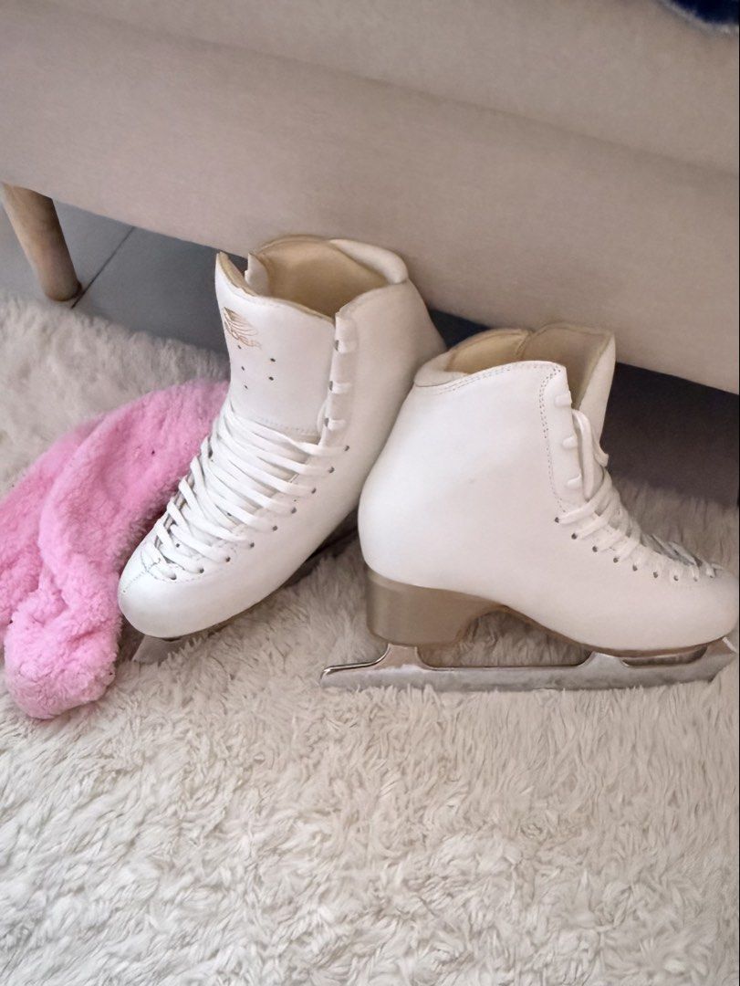 EDEA OVERTURE White Ice Skates with Pink Blade Covers (Category: Skates, Rollerblades & Scooters) located in Manila. Submitted by btsalbumssssss (Listing ID 1469819133, Image 1). Description: BARELY USED - Type: Traditional white figure skates with attached blades - Condition: Clean white leather uppers with minimal scuffing - Features: Built-in ankle support and matching white laces - Bonus: Includes a cute fluffy pink blade cover - Perfect for: