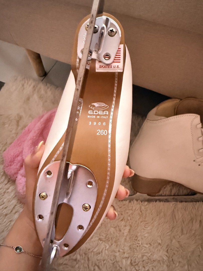 EDEA OVERTURE White Ice Skates with Pink Blade Covers (Category: Skates, Rollerblades & Scooters) located in Manila. Submitted by btsalbumssssss (Listing ID 1469819133, Image 2). Description: BARELY USED - Type: Traditional white figure skates with attached blades - Condition: Clean white leather uppers with minimal scuffing - Features: Built-in ankle support and matching white laces - Bonus: Includes a cute fluffy pink blade cover - Perfect for:
