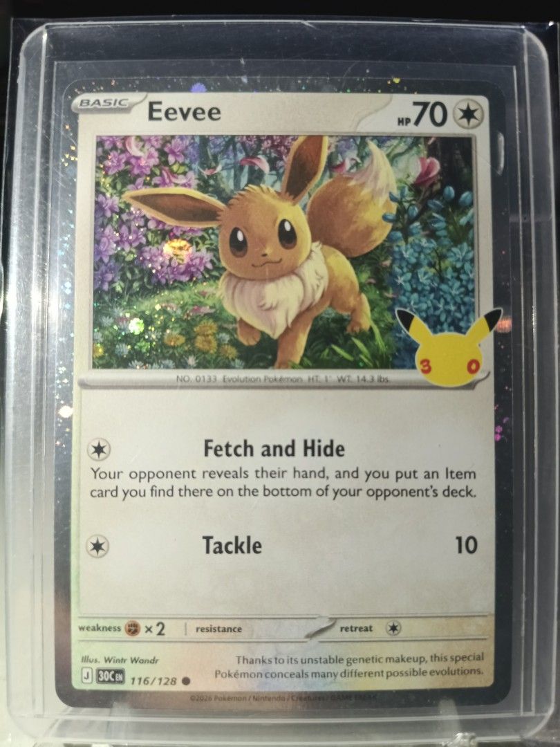 Eevee 116/128 Common (Category: Raw Singles) located in General Trias. Submitted by hobbyshare19 (Listing ID 1469823808, Image 1). Description: WTS (Want to Sell) • Character Name: Eevee (with Pikachu 30th Celebration stamp) • Card Code: 116/128 • Rarity: Common (C) / Holo • Set: 30th Celebration Expansion Set • Condition: Near Mint (Kept in OPP plastic + toploader + toploader sleeve) • Price: ₱80 • Location: General Trias, Cavite • Transaction: 