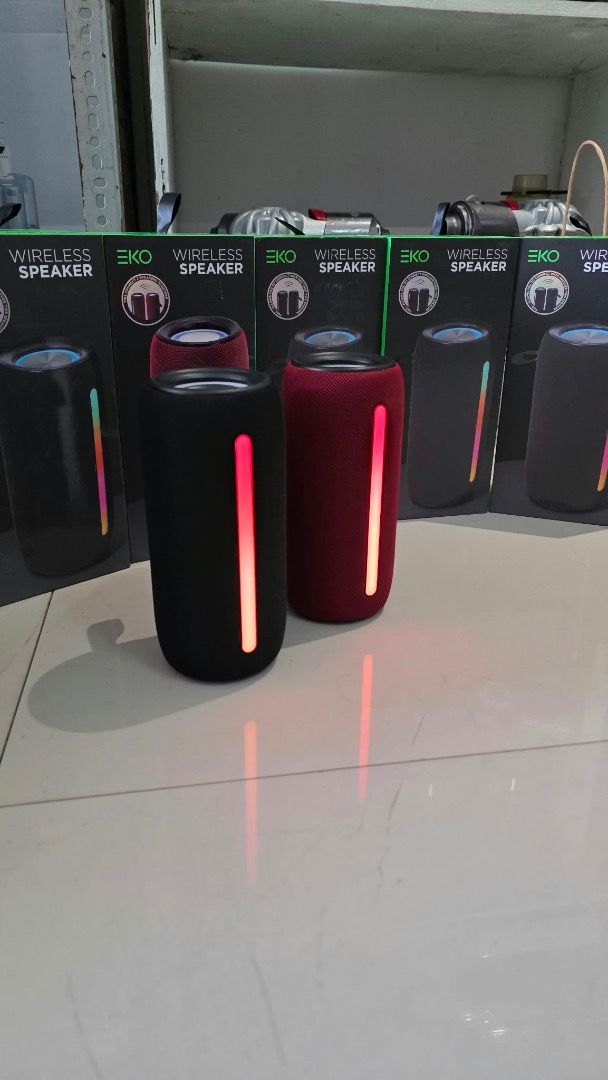 EKO Wireless Speaker with LED Light (Category: Soundbars, Speakers & Amplifiers) located in Pulilan. Submitted by sebbii (Listing ID 1469794880, Image 1). Description: - Brand new EKO wireless portable speakers - Sleek cylindrical shape wrapped in stylish fabric mesh - Eye-catching vertical red LED light strip on the front - Available in 2 colors: Black and Dark Red - Delivers great portable sound for music on the go - Comes in original retail bo