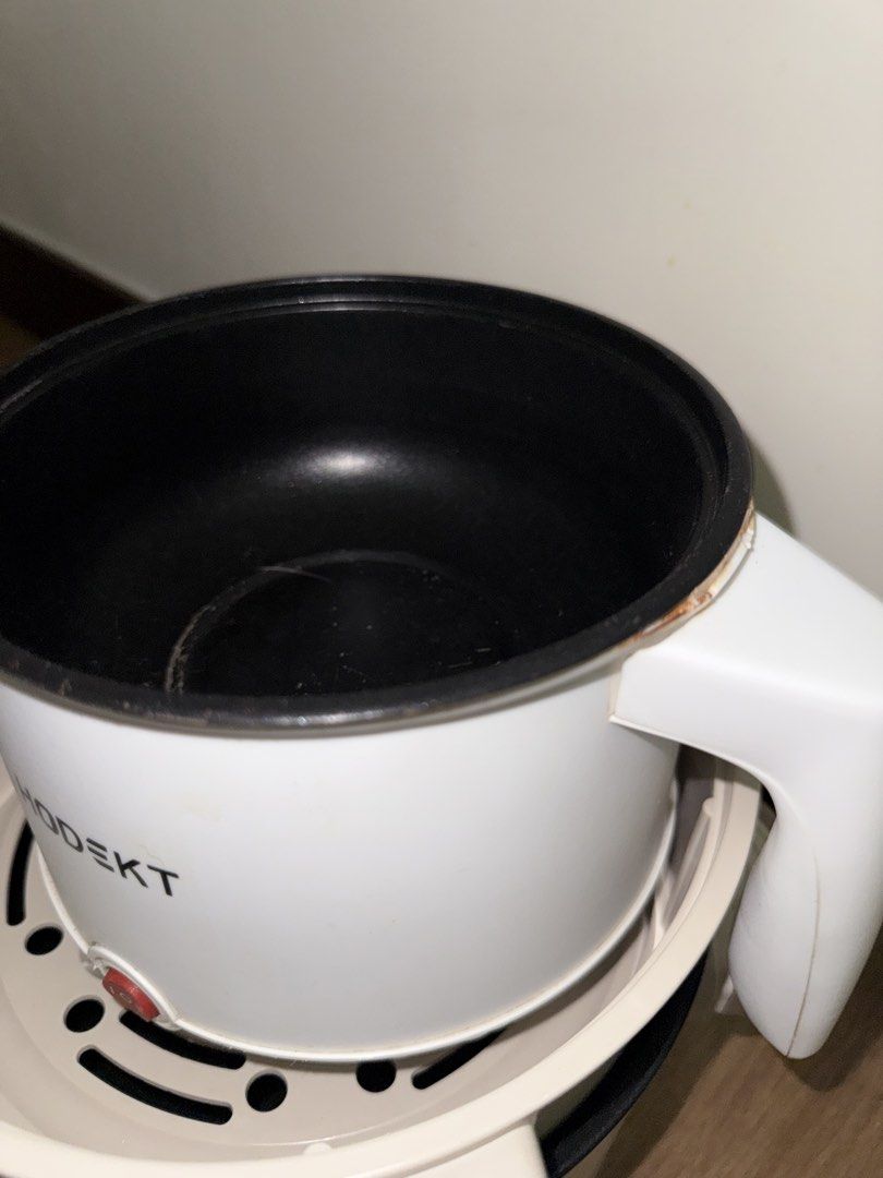 Electric cooker. TAKE ALL (Category: Cookers) located in Bulacan. Submitted by chewieeee_ (Listing ID 1469931550, Image 2). Description: 5L capacity electric cooker with 2 layers, plus an extra HODEKT pot included. Non-stick coating inside pots, shows some minor wear and stains from previous cooking use but all still works perfectly fine. RFS: bought induction cooker Original lids included. No wire included. .