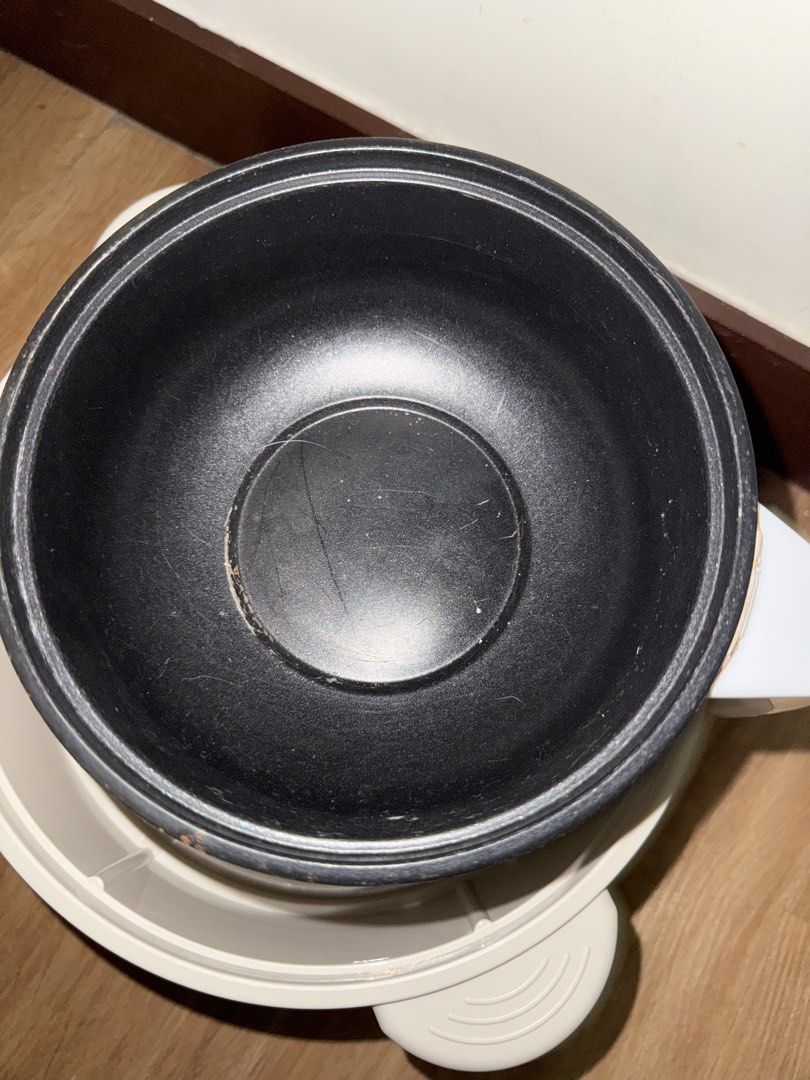 Electric cooker. TAKE ALL (Category: Cookers) located in Bulacan. Submitted by chewieeee_ (Listing ID 1469931550, Image 3). Description: 5L capacity electric cooker with 2 layers, plus an extra HODEKT pot included. Non-stick coating inside pots, shows some minor wear and stains from previous cooking use but all still works perfectly fine. RFS: bought induction cooker Original lids included. No wire included. .