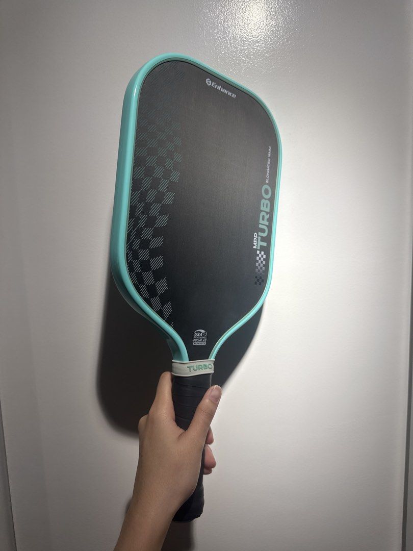 ENHANCE MPP TURBO 16MM (Category: Racket and Ball Sports) located in Manila. Submitted by ceeloved_ (Listing ID 1469816303, Image 3). Description: For sale‼️ Enhance MPP Turbo Elongated 16mm. Bought last July 2026 from the US. Grip taped and edge guarded since day 1. Lady owned. Used seldom. Extra paddle. Minimal ball marks on the paddle. No any other issues. Great paddle for beginners. With paddle cover. Selling it for only Php 4,500.00 Can do m
