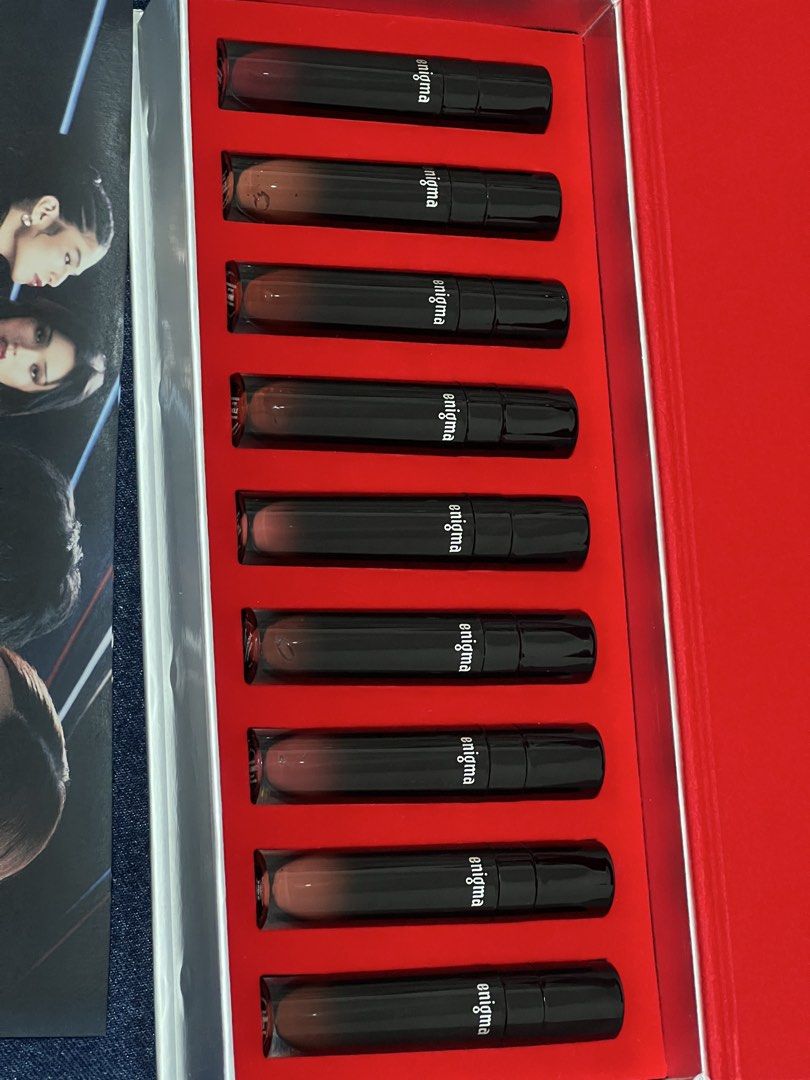Enigma Lip Tint Gift Box Set (Category: Makeup) located in Manila. Submitted by andeng30 (Listing ID 1469871792, Image 3). Description: - Full set of Enigma lip tints in a striking red display box - Features a versatile range of shades from everyday nudes to bold berries - Includes the official girl group promo photo card - 100% brand new, unswatched, and securely arranged in a molded insert - Perfect ready-to-gift bundle for makeup collectors an