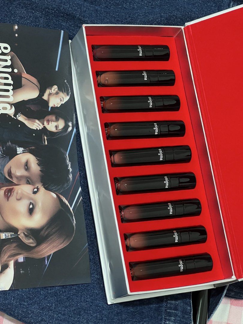 Enigma Lip Tint Gift Box Set (Category: Makeup) located in Manila. Submitted by andeng30 (Listing ID 1469871792, Image 2). Description: - Full set of Enigma lip tints in a striking red display box - Features a versatile range of shades from everyday nudes to bold berries - Includes the official girl group promo photo card - 100% brand new, unswatched, and securely arranged in a molded insert - Perfect ready-to-gift bundle for makeup collectors an