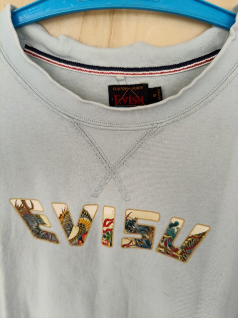 Evisu tees (Category: Tshirts & Polo Shirts ) located in La Carlota. Submitted by a_leam_art (Listing ID 1469917283, Image 3). Description: :W19 x L24 :Good condition :Bacon neckline issue :9/10 color rate.