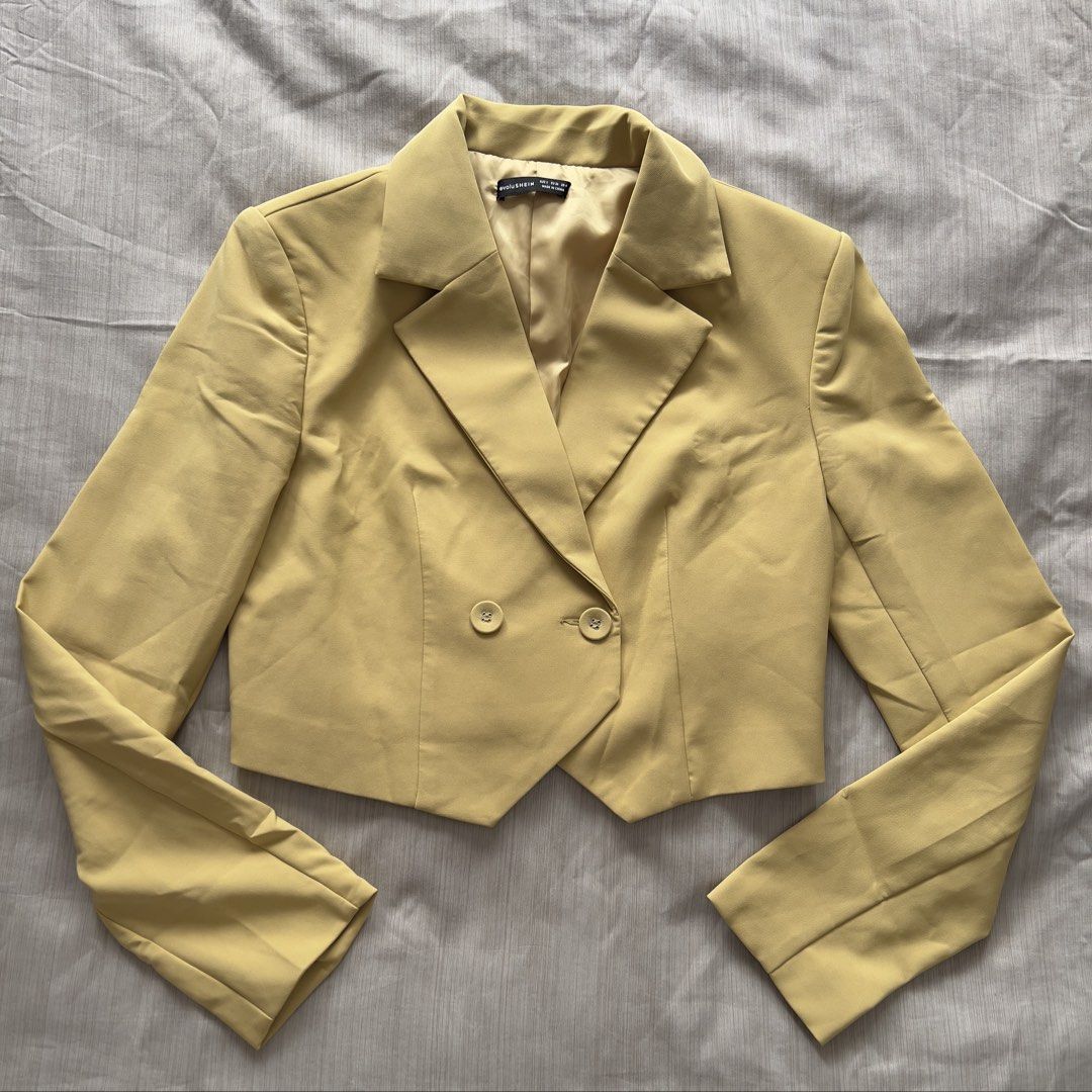evoluSHEIN Yellow Cropped Blazer Size S EU 36 (Category: Coats, Jackets and Outerwear) located in Pasig City. Submitted by jenscloset86 (Listing ID 1469832954, Image 1). Description: Brand: EvoluSHEIN Size: Small • Brand new but washed ONCE • Never worn/ never used. • No damages, no flaws. Measurement: Shoulder: 17” Length: 18” Sleeve: 26” Bust: 37”.