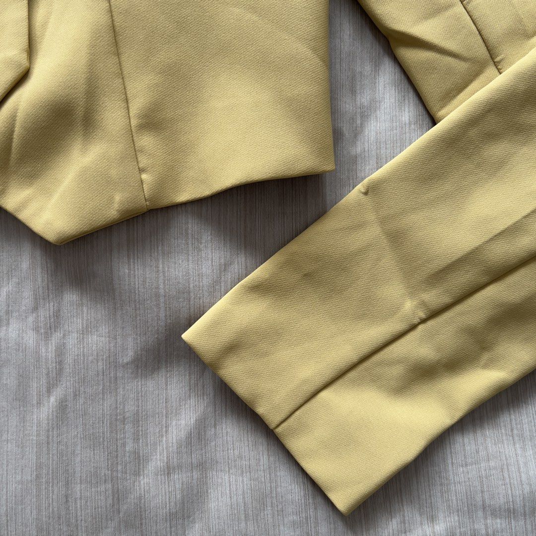 evoluSHEIN Yellow Cropped Blazer Size S EU 36 (Category: Coats, Jackets and Outerwear) located in Pasig City. Submitted by jenscloset86 (Listing ID 1469832954, Image 2). Description: Brand: EvoluSHEIN Size: Small • Brand new but washed ONCE • Never worn/ never used. • No damages, no flaws. Measurement: Shoulder: 17” Length: 18” Sleeve: 26” Bust: 37”.