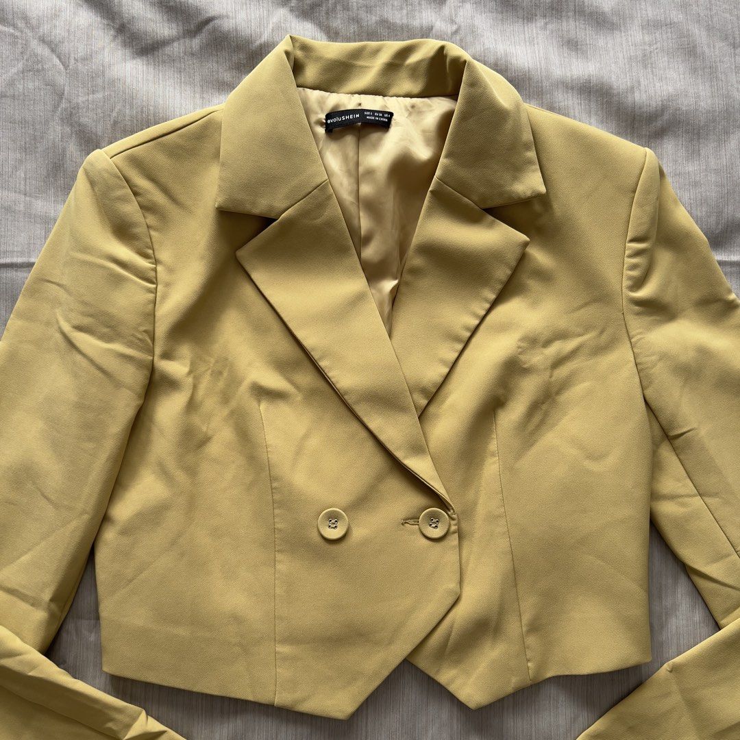 evoluSHEIN Yellow Cropped Blazer Size S EU 36 (Category: Coats, Jackets and Outerwear) located in Pasig City. Submitted by jenscloset86 (Listing ID 1469832954, Image 3). Description: Brand: EvoluSHEIN Size: Small • Brand new but washed ONCE • Never worn/ never used. • No damages, no flaws. Measurement: Shoulder: 17” Length: 18” Sleeve: 26” Bust: 37”.