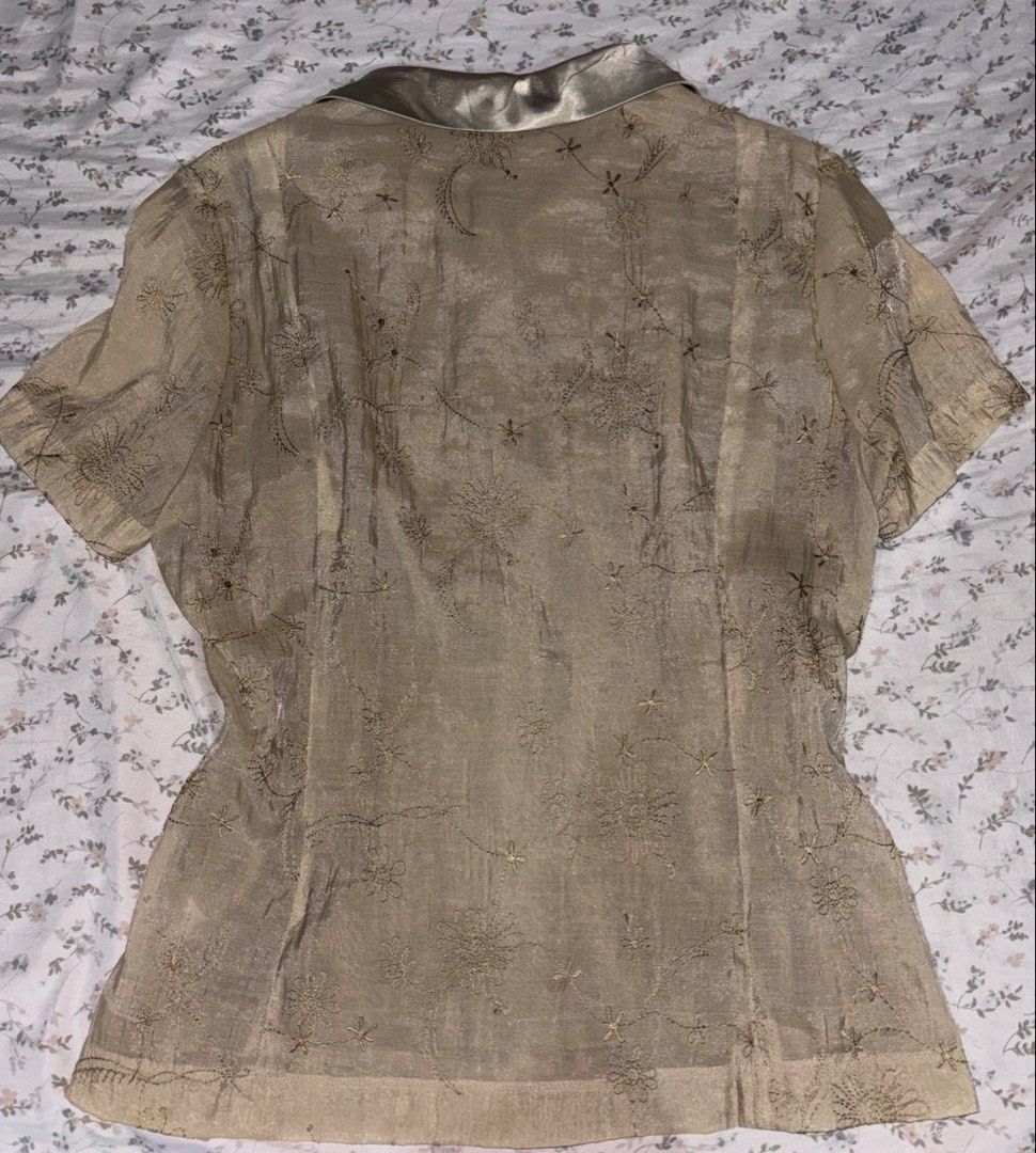 Fairy Grunge y2k Blouse (Category: Blouses) located in Davao. Submitted by dvnzaii (Listing ID 1469876438, Image 3). Description: - Brand: Rabbit - Style: Short sleeve button-down blouse (Y2K / Fairy Grunge) - Fabric: All-over floral embroidery - Details: Smooth satin collar with green beaded and sequin embellishments - Fit: Structured torso with a slightly flared hem - Closure: Front button-up.
