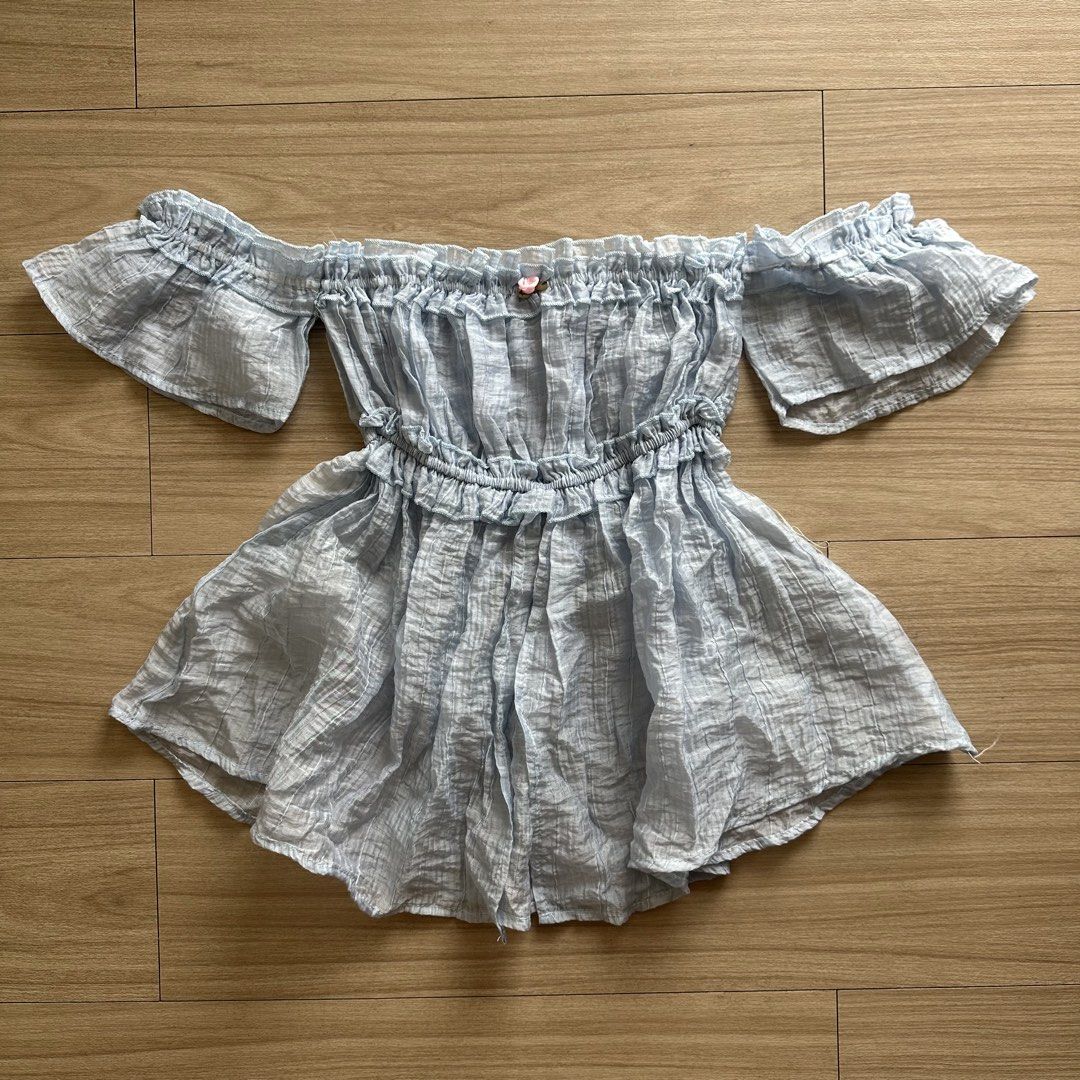 Fairycore Coquette Light Blue Off-Shoulder Top (Category: Blouses) located in Pasig City. Submitted by ruthalyssa (Listing ID 1469837863, Image 2). Description: NEVER USED! Super pretty. Di lang talaga kasya sakin huhu. Freesize, best fit S-M dahil sa sleeves. Shop’s photo on the last slide :) .