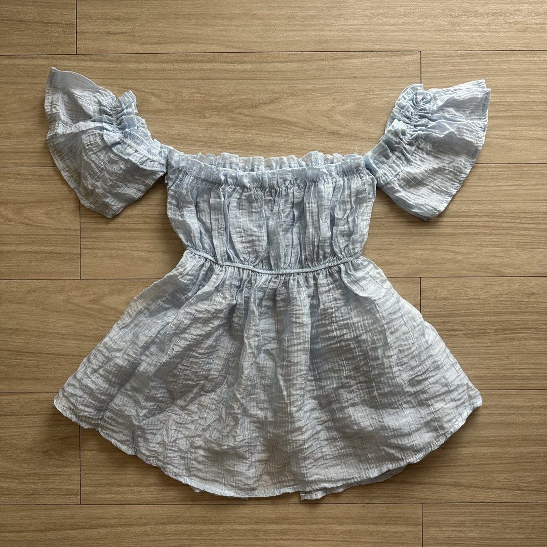 Fairycore Coquette Light Blue Off-Shoulder Top (Category: Blouses) located in Pasig City. Submitted by ruthalyssa (Listing ID 1469837863, Image 3). Description: NEVER USED! Super pretty. Di lang talaga kasya sakin huhu. Freesize, best fit S-M dahil sa sleeves. Shop’s photo on the last slide :) .