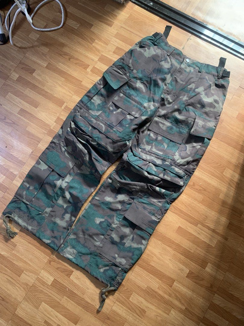 FARFROMWHAT flared camo cargo pants (Category: Joggers) located in Davao. Submitted by oplangtungyang (Listing ID 1469815811, Image 2). Description: waist: 30-32” thigh: 14” length: 41” leg hem: 10.5” no issue ₱2500shipped or offer.