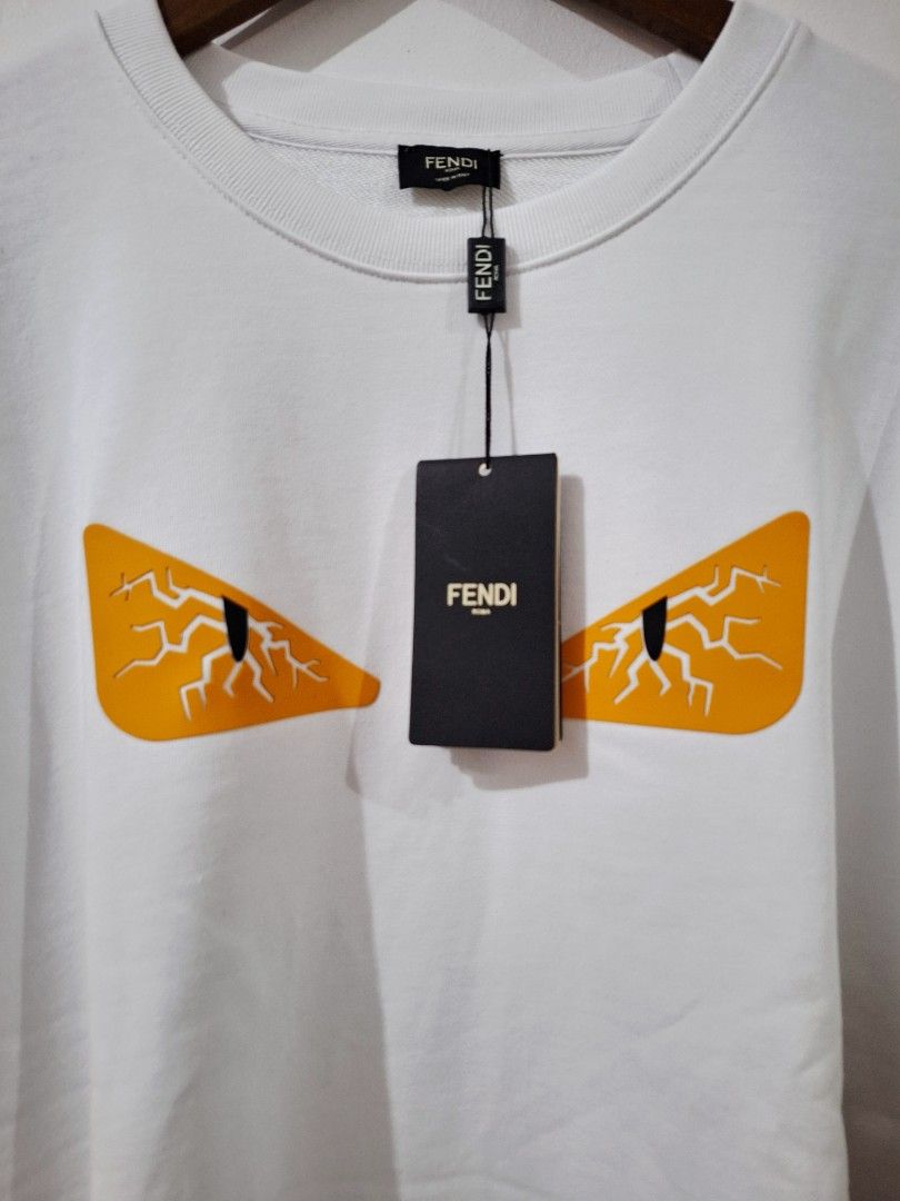 Fende crewneck sweater longsleeve (Category: Luxury Apparel) located in Santa Rosa. Submitted by pat0317 (Listing ID 1469938540, Image 2). Description: Fendi crewneck sweater brandnew no issue Monster eye Large - 23.5 x 30 sligh nego Cod cop lalamove j&t Lbc.