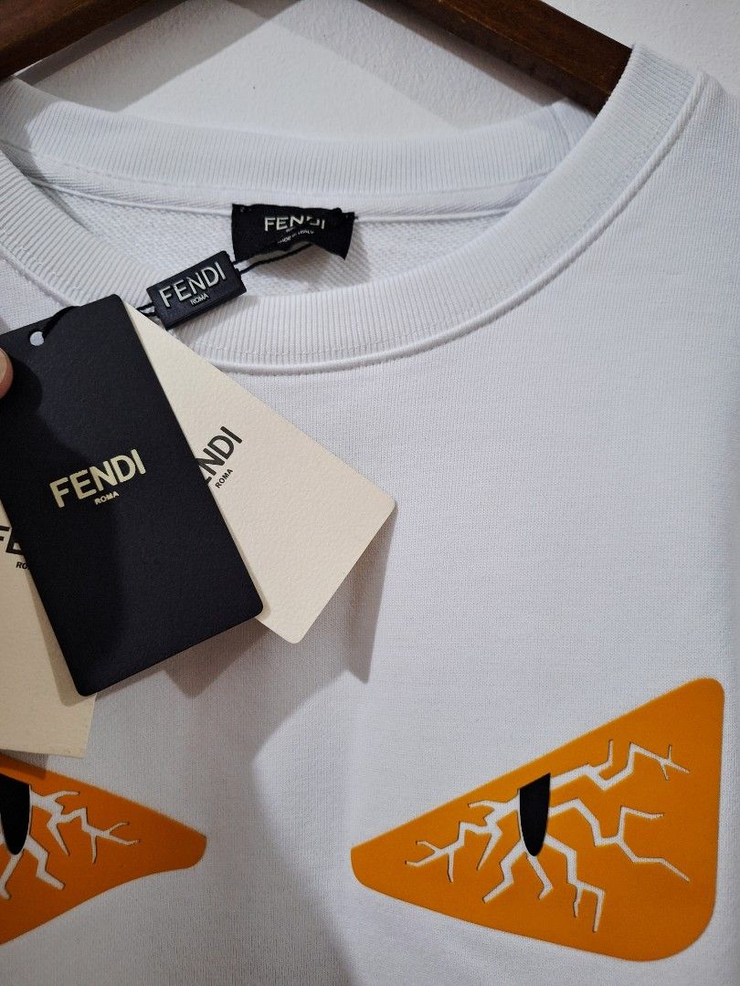 Fende crewneck sweater longsleeve (Category: Luxury Apparel) located in Santa Rosa. Submitted by pat0317 (Listing ID 1469938540, Image 3). Description: Fendi crewneck sweater brandnew no issue Monster eye Large - 23.5 x 30 sligh nego Cod cop lalamove j&t Lbc.