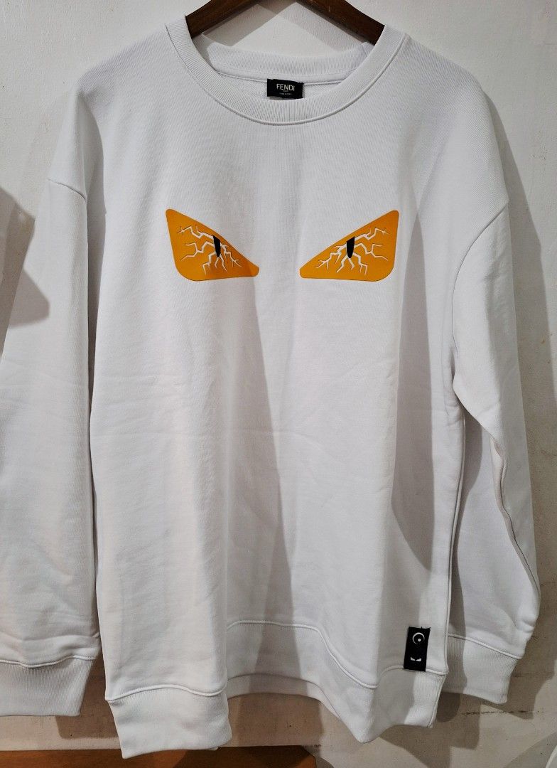Fende crewneck sweater longsleeve (Category: Luxury Apparel) located in Santa Rosa. Submitted by pat0317 (Listing ID 1469938540, Image 1). Description: Fendi crewneck sweater brandnew no issue Monster eye Large - 23.5 x 30 sligh nego Cod cop lalamove j&t Lbc.