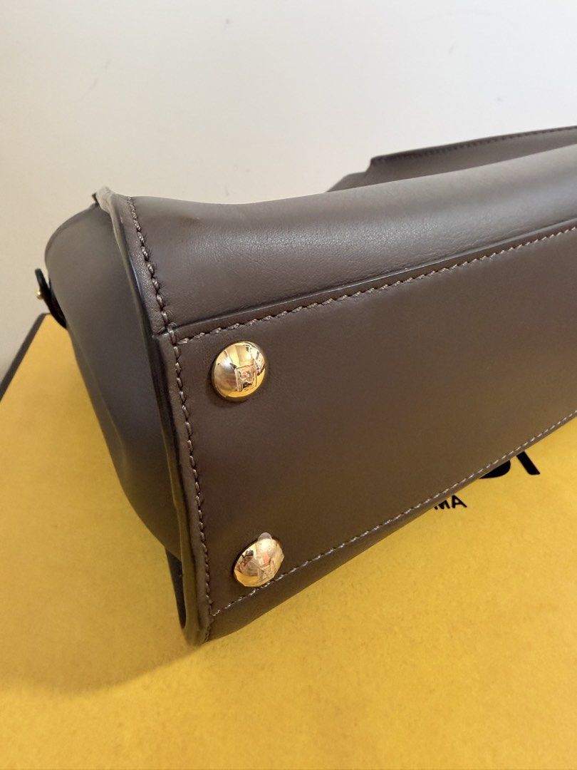 Fendi Peekaboo Dark Brown (Category: Luxury Bags & Wallets) located in Quezon City. Submitted by _cherryontop_ (Listing ID 1469853437, Image 2). Description: Mini Peekaboo (new version) 9.3-9.5/10 box,dust bag,long strap,authentication.