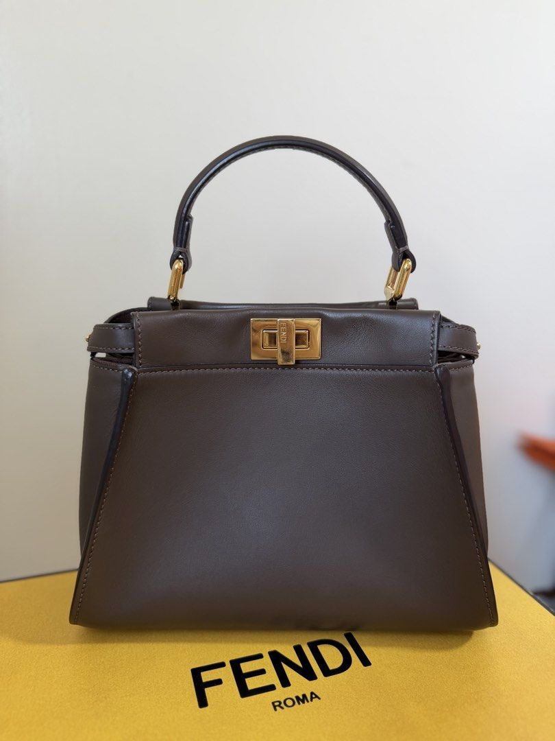 Fendi Peekaboo Dark Brown (Category: Luxury Bags & Wallets) located in Quezon City. Submitted by _cherryontop_ (Listing ID 1469853437, Image 1). Description: Mini Peekaboo (new version) 9.3-9.5/10 box,dust bag,long strap,authentication.