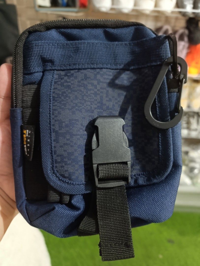 FieldCore Cordura Fabric Utility Pouch Blue (Category: Belt bags, Clutches and Pouches) located in Bacoor. Submitted by MommahAnnaOnlineShop (Listing ID 1469877022, Image 1). Description: - Authentic FieldCore utility pouch made with tough Cordura fabric - Stylish blue body with a front digital camo flap - Equipped with smooth YKK zippers and a secure quick-release buckle - Features an attached carabiner and a back loop for easy belt mounting - B