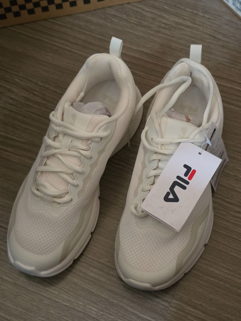 Fila Graviton N3 White Sneakers Size (Category: Sneakers) located in Caloocan City. Submitted by wr_lo715 (Listing ID 1469769884, Image 1). Description: - Brand: Fila Graviton N3 - Color: All-White - Condition: Brand new, never worn, comes with original shoe box - Features: Trendy chunky sole, breathable mesh paneling, tonal overlays, and lace-up closure with logo tag - Deal: Guaranteed clean pair, ready to ship or meet up.