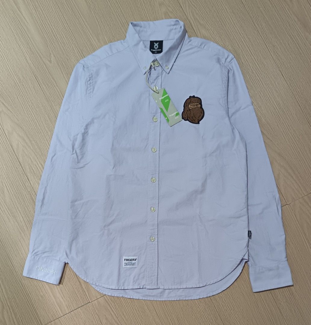 FINGERCROXX BUTTON DOWN LONGSLEEVE (Category: Tshirts & Polo Shirts ) located in Cavite. Submitted by marcuz.lifestyle (Listing ID 1469799550, Image 1). Description: WIDTH:20 LENGTH:27.5 SLEEVE LENGTH:25 DEAD STOCK CONDITION VERRYGOOD CONDITION NO ISSUE NEED WASH ONLY COLOR RATE:9.5/10 MOP:GCASH DELIVERY COURIER:JNT LOCATION:IMUS CAVITE.