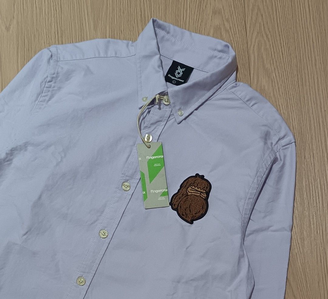 FINGERCROXX BUTTON DOWN LONGSLEEVE (Category: Tshirts & Polo Shirts ) located in Cavite. Submitted by marcuz.lifestyle (Listing ID 1469799550, Image 3). Description: WIDTH:20 LENGTH:27.5 SLEEVE LENGTH:25 DEAD STOCK CONDITION VERRYGOOD CONDITION NO ISSUE NEED WASH ONLY COLOR RATE:9.5/10 MOP:GCASH DELIVERY COURIER:JNT LOCATION:IMUS CAVITE.
