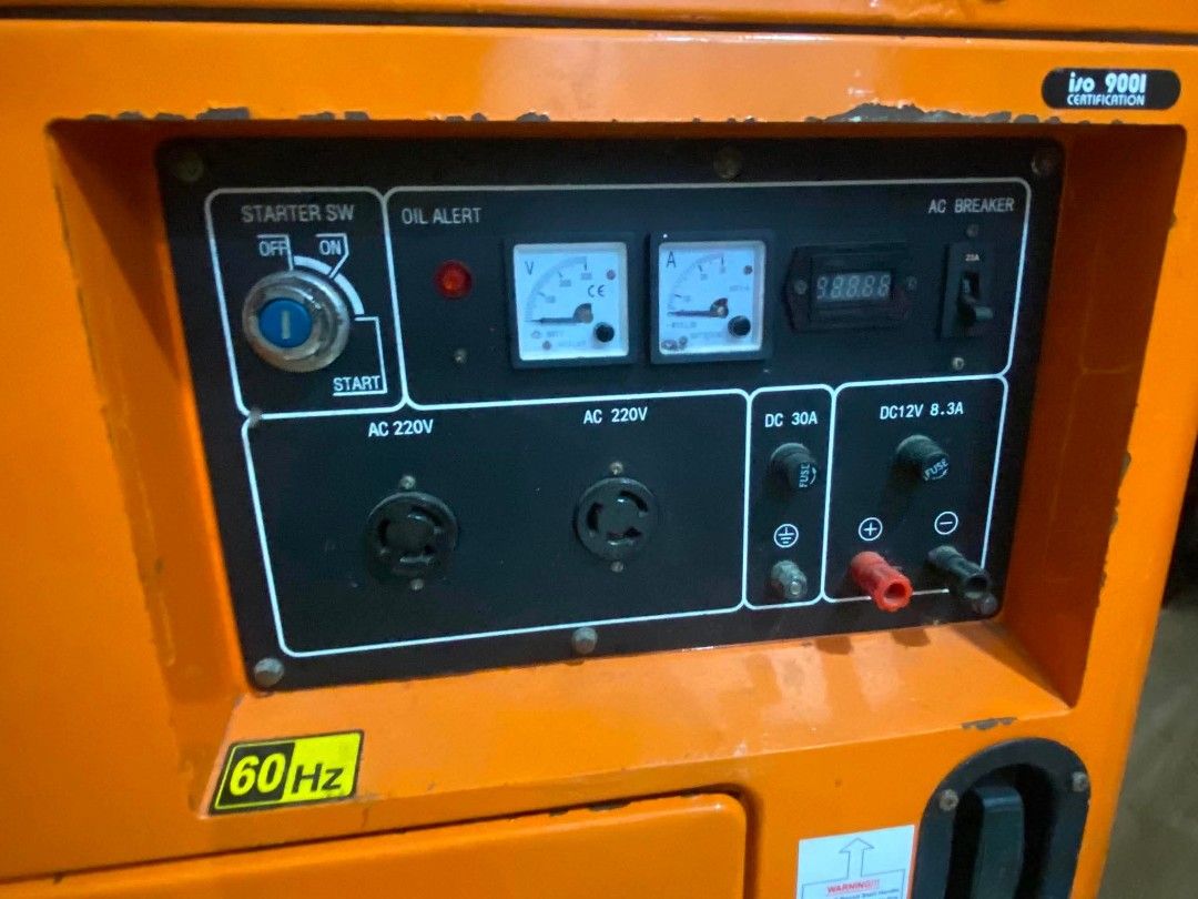 Firefly FX7200D-12 Diesel Engine Generator (Category: Industrial Equipment) located in Cebu City. Submitted by sherosales (Listing ID 1469875982, Image 3). Description: - Location: Cebu City - Brand/Model: Firefly FX7200D-12 Heavy-Duty Diesel Generator - Color/Design: Bright orange with silent-type housing and built-in wheels for mobility - Control Panel: Starter switch, oil alert light, voltage & amp meters - Power Outputs: Two AC 220V outlets, 
