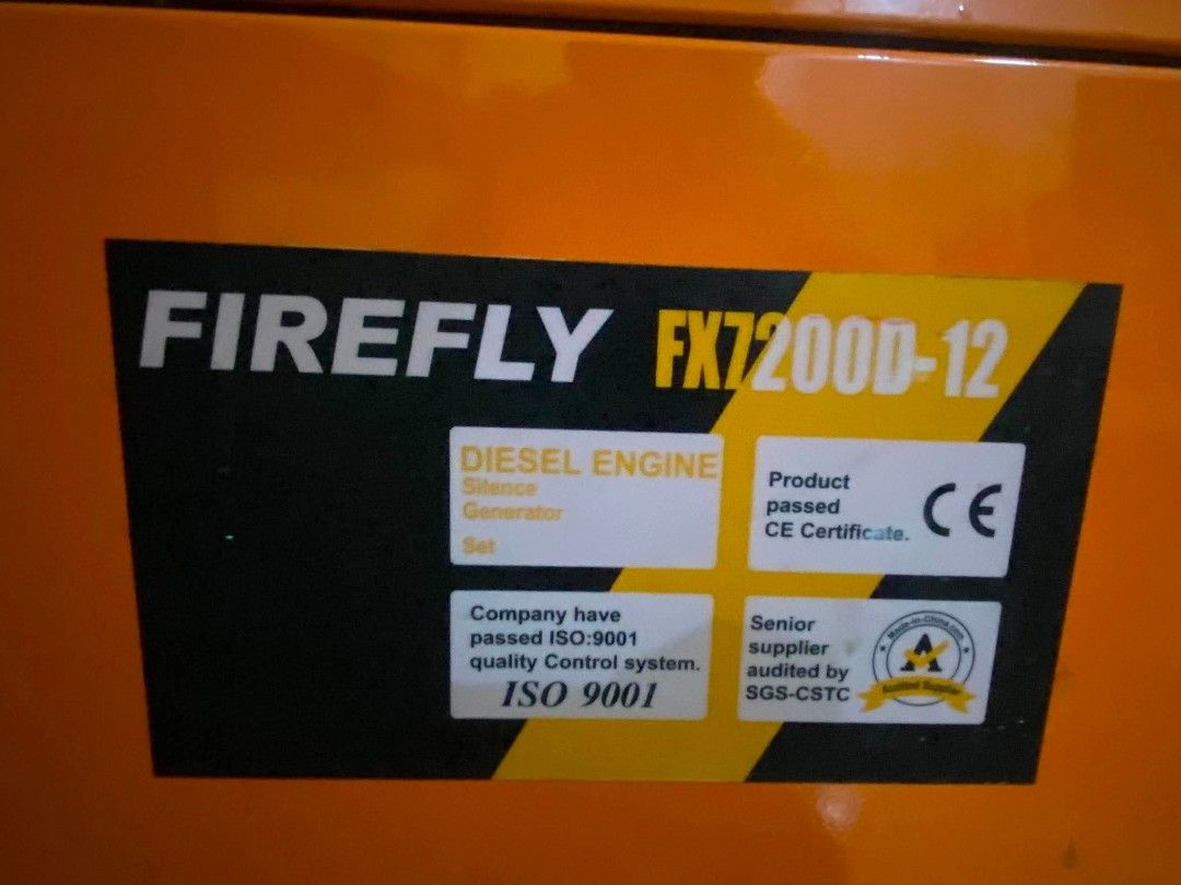 Firefly FX7200D-12 Diesel Engine Generator (Category: Industrial Equipment) located in Cebu City. Submitted by sherosales (Listing ID 1469875982, Image 2). Description: - Location: Cebu City - Brand/Model: Firefly FX7200D-12 Heavy-Duty Diesel Generator - Color/Design: Bright orange with silent-type housing and built-in wheels for mobility - Control Panel: Starter switch, oil alert light, voltage & amp meters - Power Outputs: Two AC 220V outlets, 