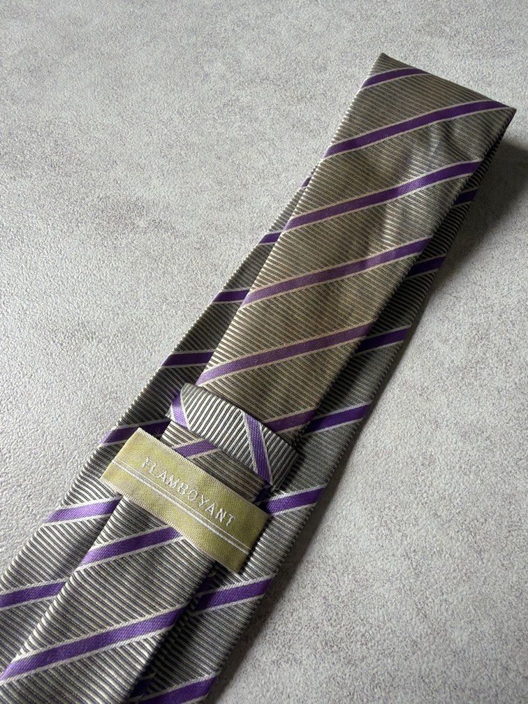 Flamboyant Striped Necktie (Category: Ties) located in Pasig City. Submitted by chamoisee (Listing ID 1469804091, Image 3). Description: Flamboyant Striped Necktie Major stain.