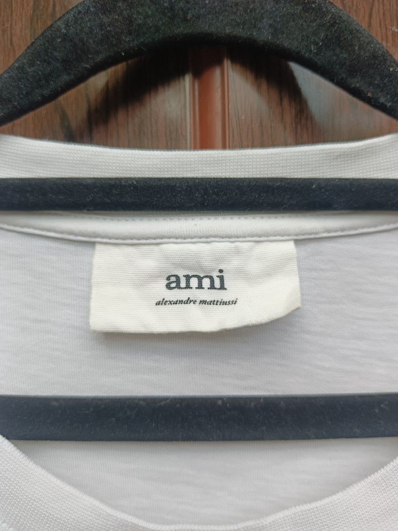 (AUTHENTIC) FOR SALE AMI WHITE TEE (Category: Activewear) located in Koronadal. Submitted by 9509thrift (Listing ID 1469438362, Image 2). Description: AMI WHITE TEE GOOD CONDITION NO HIDDEN ISSUE NEED WASH LANG PO CAN DO J&T 1200+SF.
