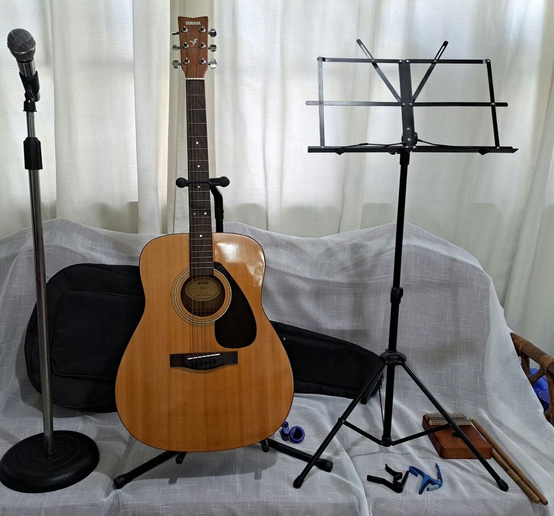 For sale Guitar (Category: Musical Instruments) located in Las Pinas. Submitted by mitchvinluan (Listing ID 1469765066, Image 1). Description: For Sale : Musical Instruments (Package selling) 1. Yamaha F310 -Guitar 2. 17 Key Kalimba 3. Guitar bag 4. Microphone 5. Microphone Stand 6. Lyric Stand 7. Drum Stick 8. Capo Price : as package selling 10k php as is where is " Good Condition " (Slightly used) almost new.....