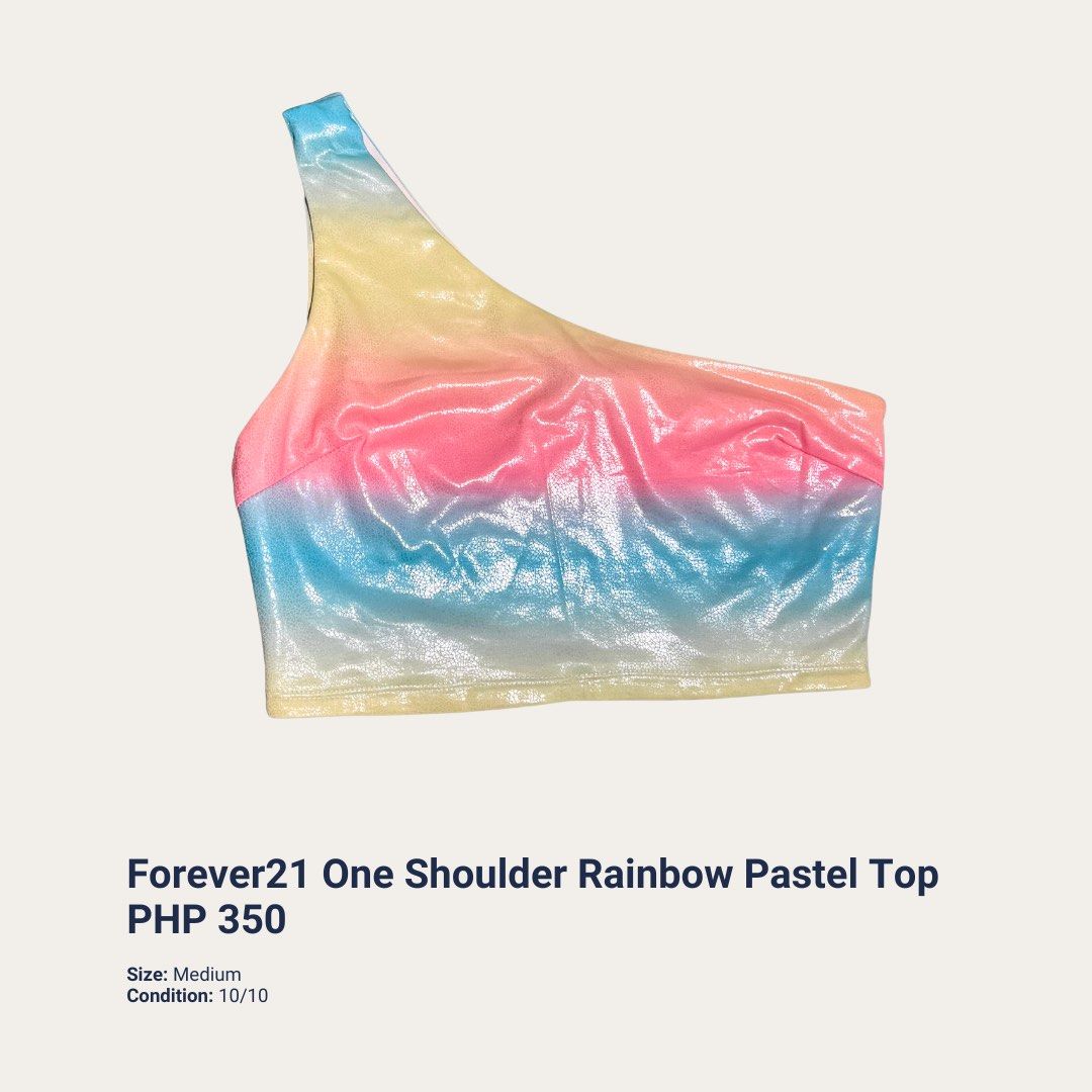 Forever21 One Shoulder Rainbow Pastel Top (Category: Sleeveless) located in Quezon City. Submitted by mjpnp (Listing ID 1469898300, Image 1). Description: - Brand: Forever21 - Style: One-shoulder crop top with subtle shiny foil texture - Color: Pastel rainbow - Size: Medium (with US, EU, UK, and CN tags) - Perfect for: Casual days, hangouts, or parties - Styling tip: Looks great with high-waisted jeans or skirts.