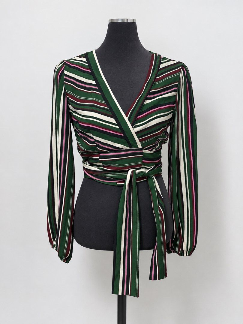 Forever 21 Green Striped Wrap Crop Top (Category: Blouses) located in Santa Cruz. Submitted by zellethrifts (Listing ID 1469927289, Image 1). Description: • Bought in Japan 🇯🇵 • Used once / Like new • Fits medium to large • In excellent condition • Photos taken using mannequin only 🚚 Shipping via J&T only 📦 Shipping fee to be shouldered by buyer 💳 Mode of payment: GCash 📍 Santa Cruz, Laguna.