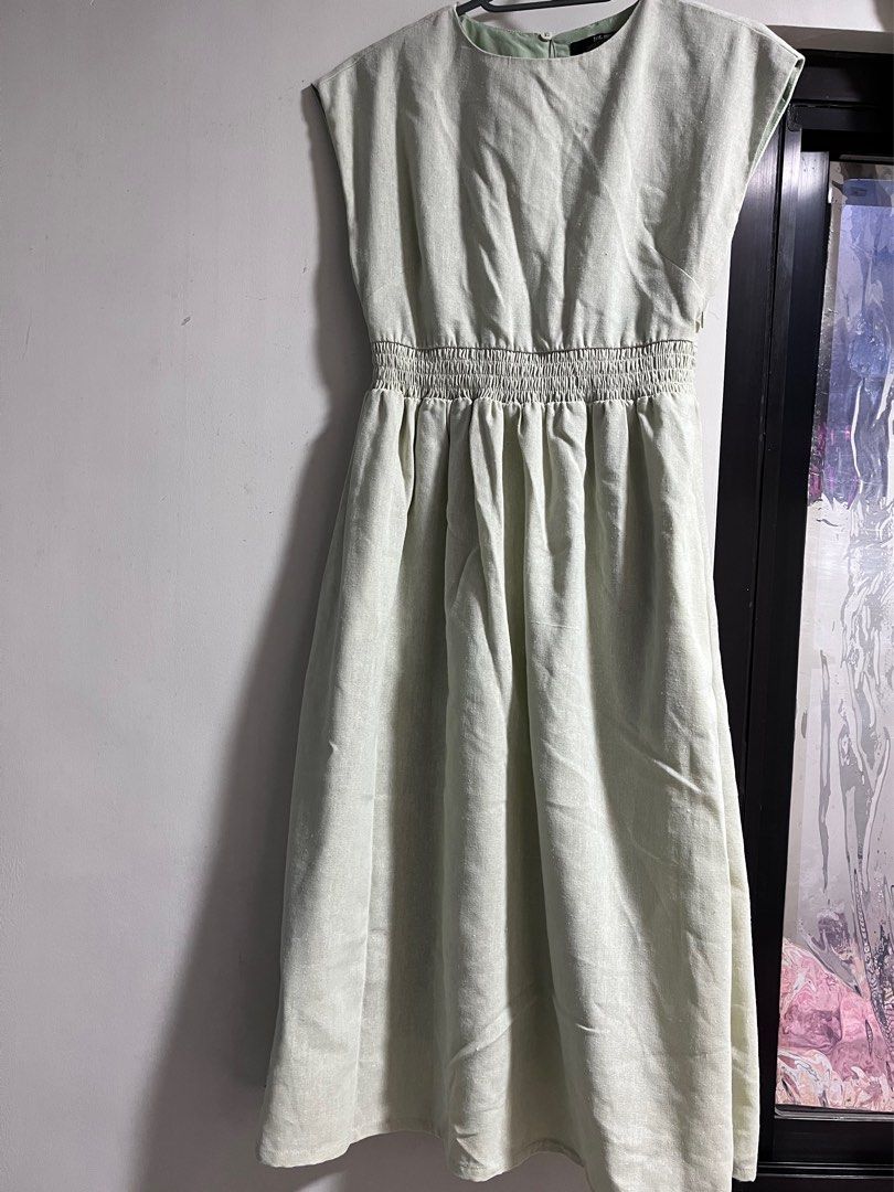 FORME Sage Green Linen Dress (Category: Dresses) located in Mexico. Submitted by inthetropics (Listing ID 1469895504, Image 1). Description: No flaws. Not faded. Lighting may affect the photo quality. Used a few times. Mall bought. Linen fabric with inner lining. Best for airconditioned room/cold weather. Extra small on tag..