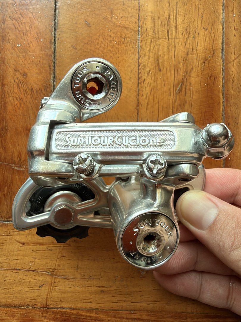 FOR SALE: Bicycle Components (Category: Bicycles) located in Manila. Submitted by tropical.ivy_ph (Listing ID 1469791732, Image 1). Description: FOR SALE: Bicycle Components 1. SunTour Cyclone RD-1700 Rear Derailleur * Compatible with 5/6/7-speed setups * Price: ₱4,500 2. Vintage SunTour Cyclone VX Downtube Shifters * Price: ₱1,500 3. Tange Seiki Silver Bottom Bracket * 68 mm shell width * 118 mm spindle length * JIS square taper * Price: ₱2,000 