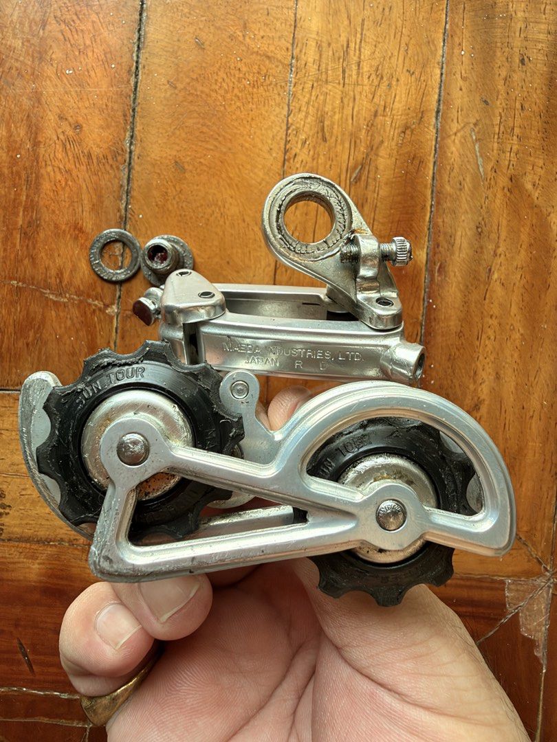 FOR SALE: Bicycle Components (Category: Bicycles) located in Manila. Submitted by tropical.ivy_ph (Listing ID 1469791732, Image 2). Description: FOR SALE: Bicycle Components 1. SunTour Cyclone RD-1700 Rear Derailleur * Compatible with 5/6/7-speed setups * Price: ₱4,500 2. Vintage SunTour Cyclone VX Downtube Shifters * Price: ₱1,500 3. Tange Seiki Silver Bottom Bracket * 68 mm shell width * 118 mm spindle length * JIS square taper * Price: ₱2,000 