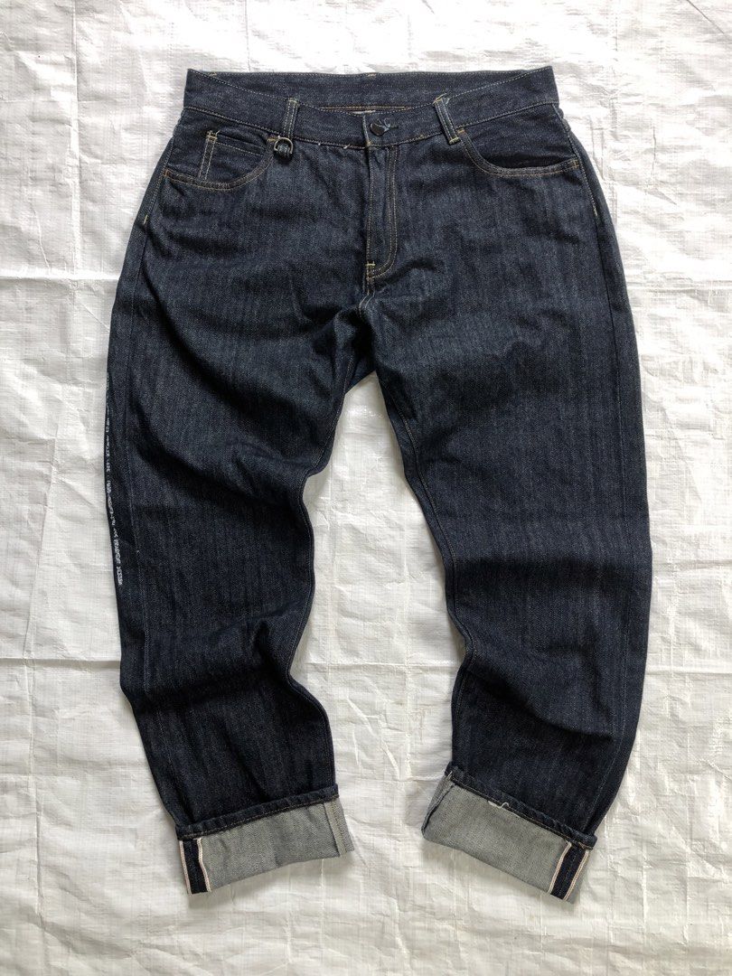 Fragment Design Jeans and GU Active Shirt Bundle (Category: Tshirts & Polo Shirts ) located in Manila. Submitted by tunicy2k (Listing ID 1469784981, Image 2). Description: - Bundle includes: Dark denim jeans and black GU Active collared shirt (Size M) - Jeans feature bold white Fragment branding on the back and signature lightning bolt pocket embroidery - Shirt includes a convenient front pocket detail - Photos show actual items laid flat on a wh