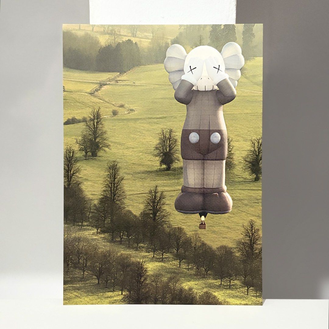 Framed KAWS Postcard “HOLIDAY” (Category: Art & Prints) located in Santa Rosa. Submitted by shikaricollectibles (Listing ID 1469867335, Image 3). Description: Framed KAWS Postcard “HOLIDAY” An art postcard from the merchandisecollection released for the KAWS TOKYO FIRST exhibition in 2021. Postcard Size: 5.9 x 4.15 inches Frame Size: 11.5 x 9.7 inches Frame Thickness: 1 inches Frame Color: White Glazing: Glass Mat Border: 2 Inches Mat Color: Off-