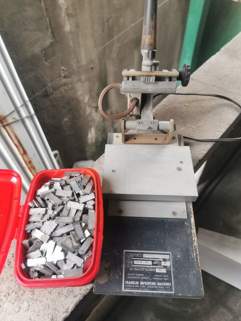 Franklin Imprinting Machine with Metal Type Set (Category: Craft Supplies & Tools) located in Quezon City. Submitted by jw_essentials (Listing ID 1469840993, Image 1). Description: - Brand/Model: Franklin Hot Stamping Machine - Specs: 115 AC-DC, 90 watts, Converted to 220volts heavy-duty metal construction - Inclusions: Red plastic container and a full cardboard box of metal letter/number type pieces - Ideal for: Bookbinding, leather crafting, an