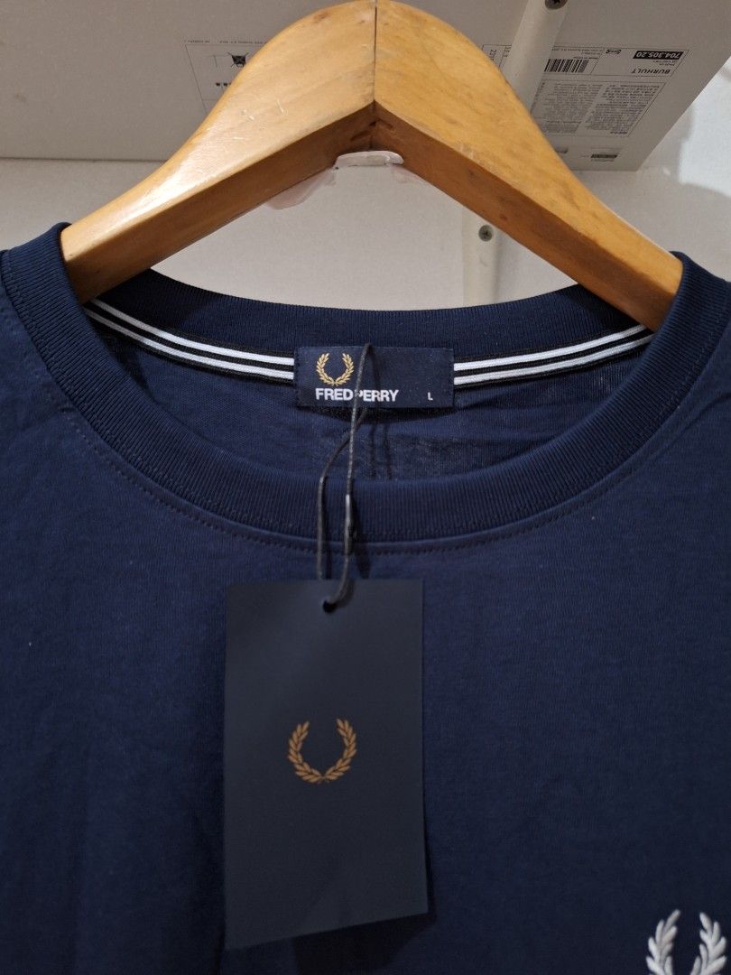 Fred perry tshirt navy blue (Category: Tshirts & Polo Shirts ) located in Muntinlupa City. Submitted by kstefanomela14 (Listing ID 1469859475, Image 2). Description: brandnew legit fred perry tshirt small - 19x26 medium - 20x27 large - 21x28 xl - 22x29 cod cop j&t lalamove lbc.