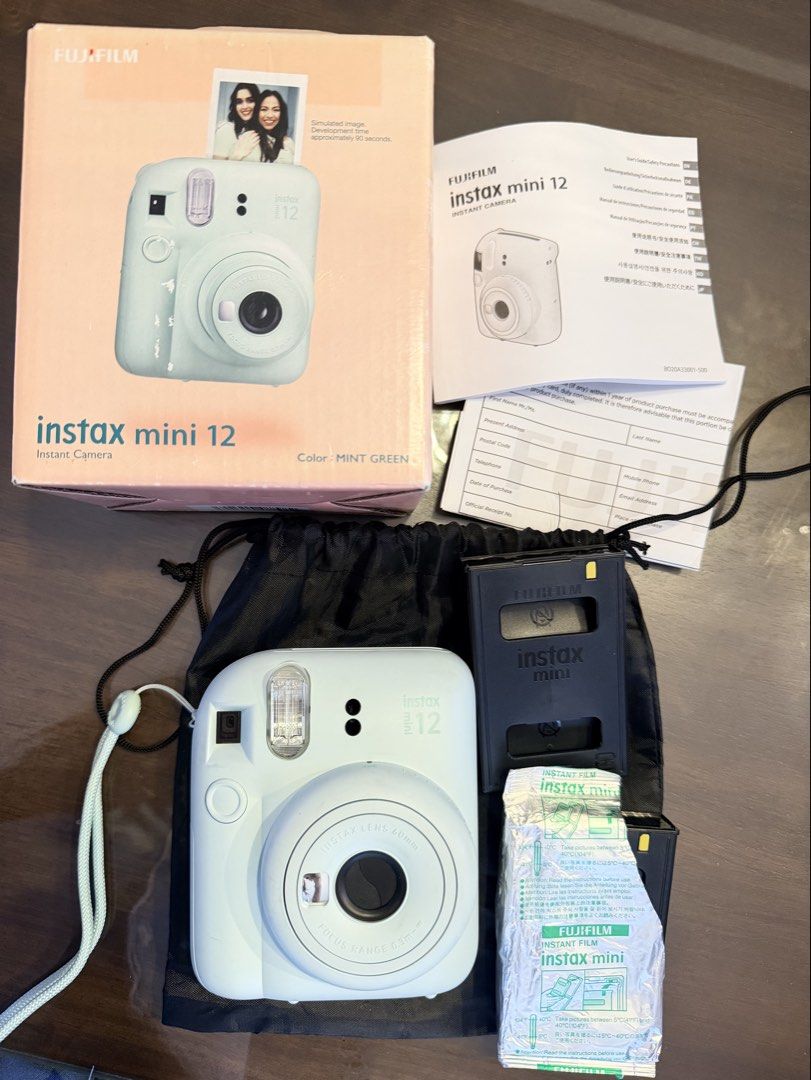 FUJIFILM INSTAX MINI 12 (Personal Preloved) (Category: Cameras) located in Olongapo. Submitted by tbhcollect88551 (Listing ID 1469826960, Image 1). Description: preloved instax mini 12 •₱4,000 •working condition, no operation issues •with free (1) unused film, (1) used with remaining film •with minimal dirt pero di naman masyadong halata •payment first •shipping: j&t / lalamove •loc: san fernando, pampanga.
