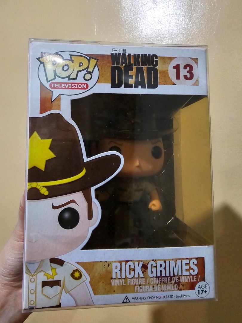Funko Pop Rick Grimes Walking Dead Rare (Category: Designer & Blind Box Toys) located in Quezon City. Submitted by bokkimmy (Listing ID 1469834771, Image 1). Description: 10/10 condition with transparent protective case.