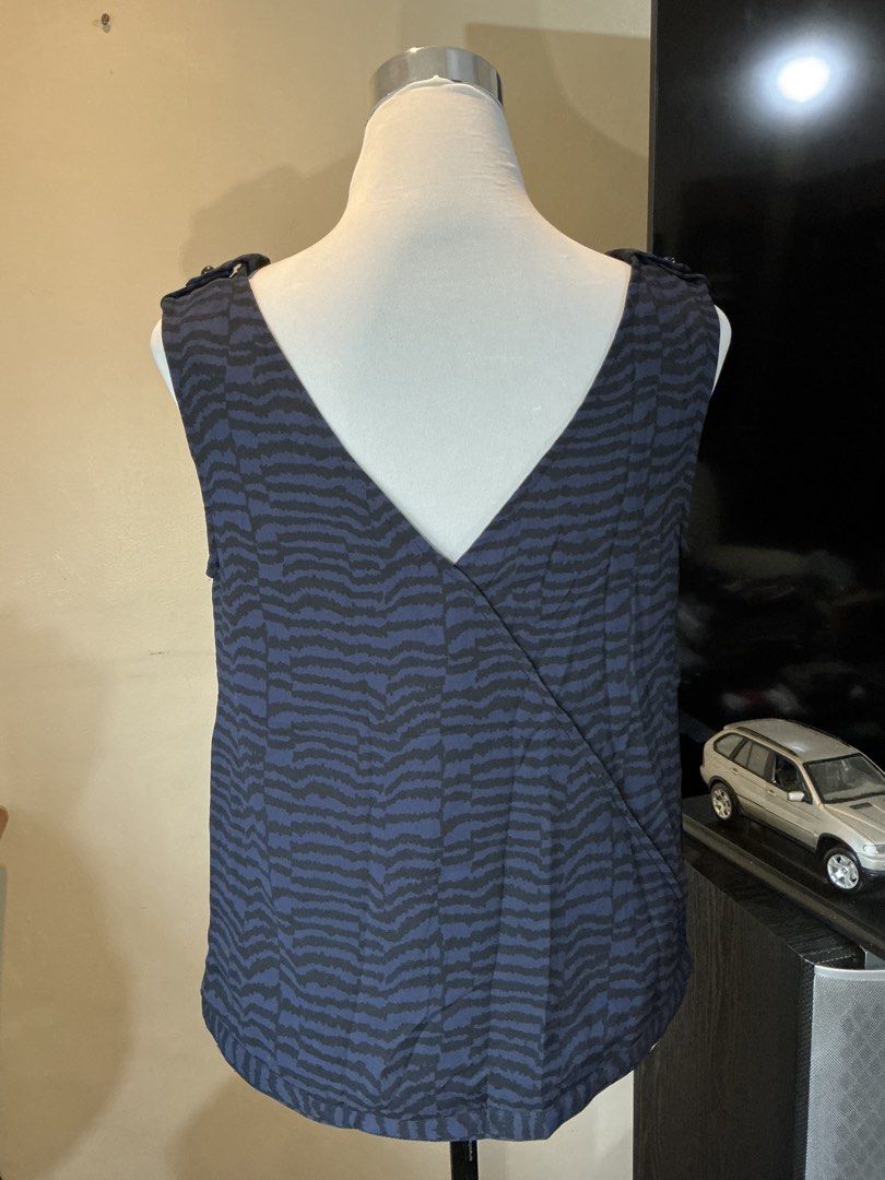GAP Navy Blue Sleeveless Cowl-neck Top (Category: Sleeveless) located in Quezon City. Submitted by shopabilitymnl (Listing ID 1469857700, Image 2). Description: Size: S-M No issue Mannequins’s Size: - Bust: 36-37 inches - Body Length: 23 inches .