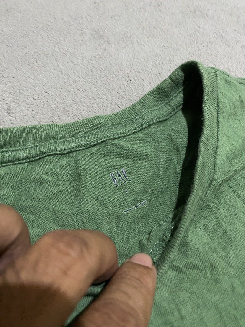 Gap shirt (Category: Babies & Kids Fashion) located in Tabaco. Submitted by centthrif55361 (Listing ID 1469865402, Image 3). Description: Gap Large on tag W:16 L:23 Excellent condition Color rate 9.4/10 Issue stain need wash .