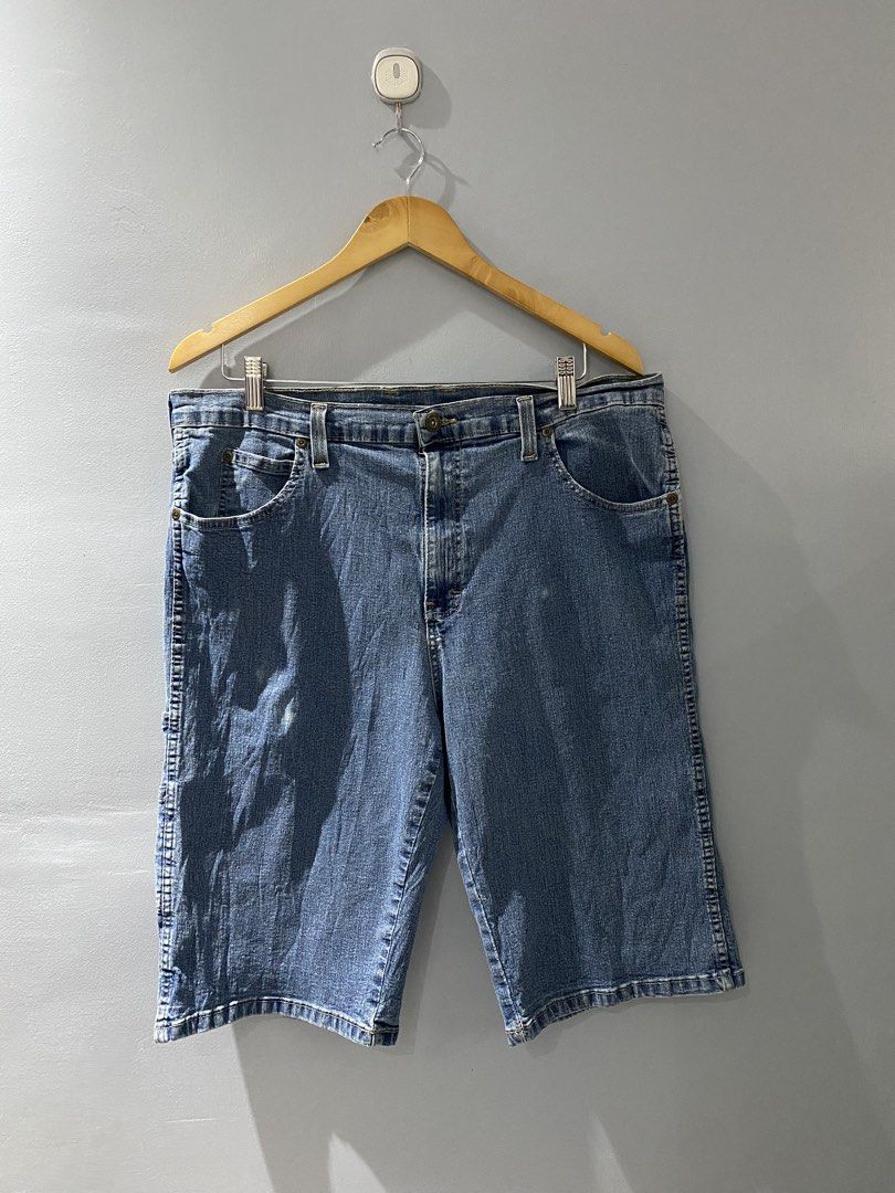 Genuine Dickies Denim Cargo Shorts Size 38 (Category: Shorts) located in Bangued. Submitted by koroysthrifts (Listing ID 1469885576, Image 3). Description: - Brand: Genuine Dickies 38x23.5x10.5 - Item: Denim cargo shorts - Color: Blue - Size: 38 waist - Material: 82% cotton, 16% polyester, 2% spandex blend for extra stretch - Features: Multiple utility pockets including side cargo pockets, button closure with zip fly - Origin: Made in Mexico - Co